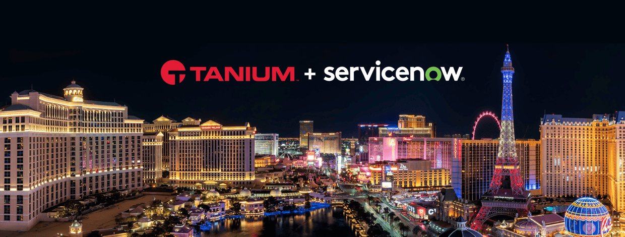 Loghi Tanium + ServiceNow su uno scatto notturno della Strip di Las Vegas