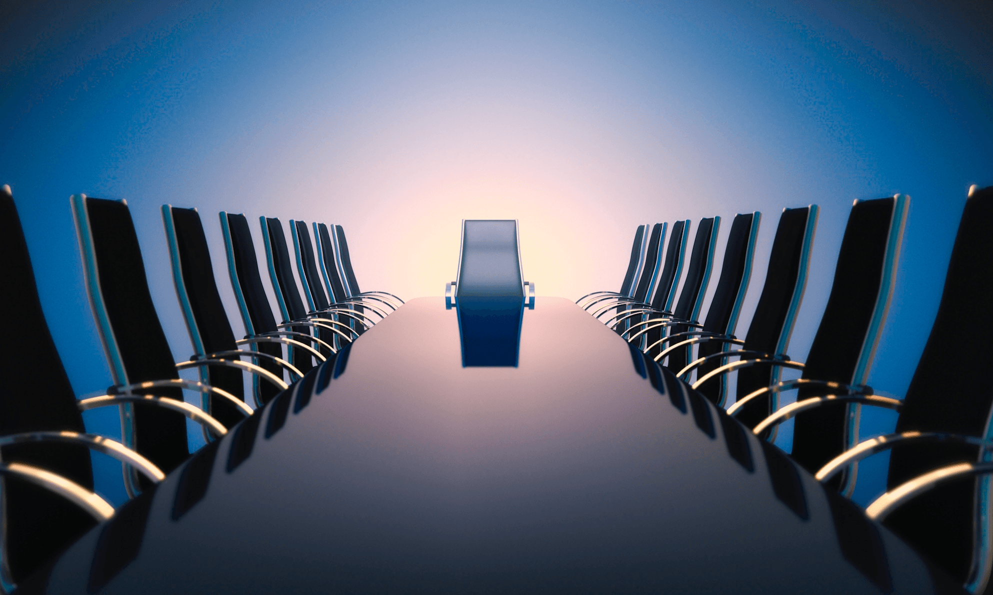 A long, black boardroom table buffed to a high-gloss finish and lined with chairs stretches into the distance, with a sunrise beyond.