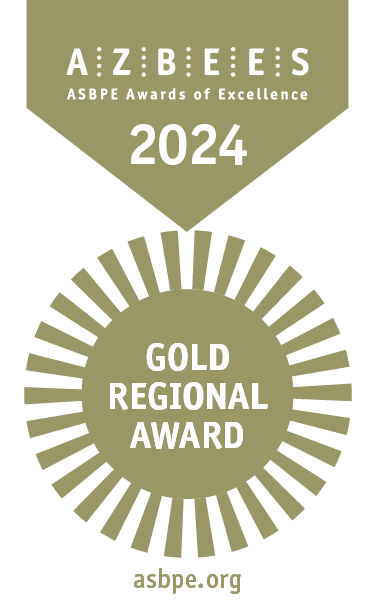 Immagine di una medaglia dorata e bianca appesa a un nastro su cui è riportata la scritta: “Azbees 2024, Premio regionale d’oro”