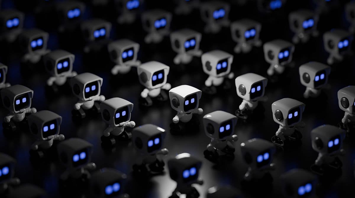 File di simpatici piccoli robot in una luce fioca.